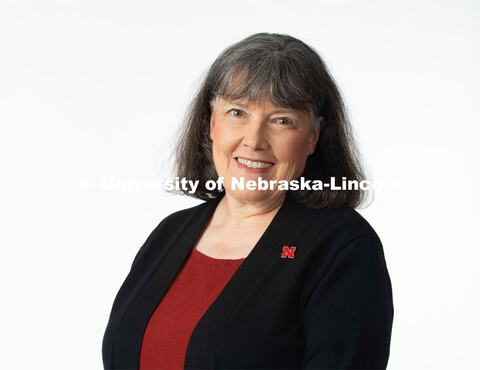 Studio portrait of Mary Kay Quinlan, Associate Dean, College of Journalism and Mass Communications. 