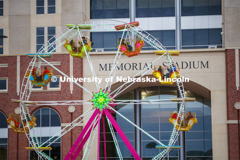 A Ferris wheel gave its riders a view of the stadium loop. Cornstock celebration and Homecoming Para
