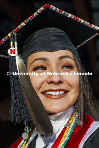 In celebration of commencement, Angelica Solomon's regalia will include a hand-beaded design and an 