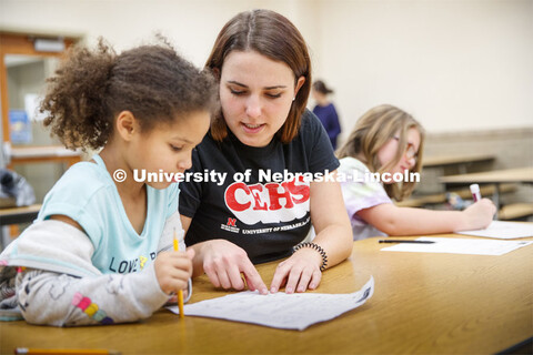 Samantha Wolff, a senior secondary education major, works with Hartley Elementary students during th