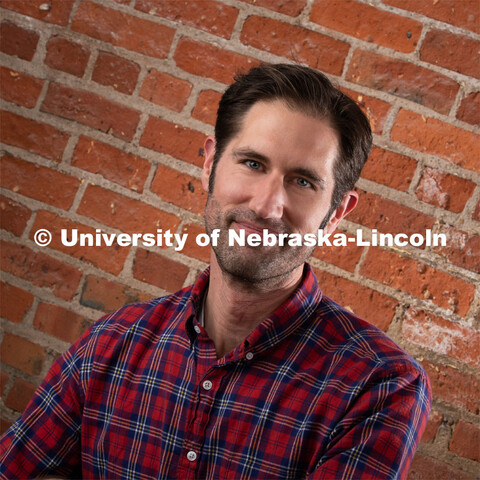 Studio portrait of Aaron Coleman, Senior Web Developer, Office of University Communication. December