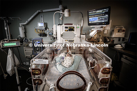 Erica Ryherd looks in on Ah'Mel, a patient at Nebraska Med’s Newborn Intensive Care Unit. Ah'Mel w