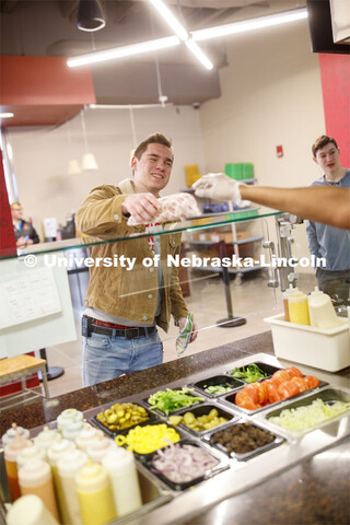 Abel Sandoz Dining Center photo shoot. Student's pick up their order at Husker Heroes. March 3, 2020