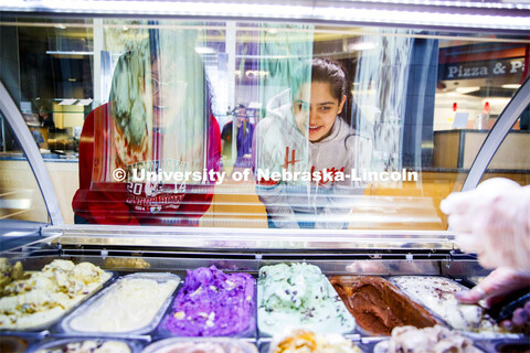 Abel Sandoz Dining Center photo shoot. Young women decide which flavor of gelato would taste best at