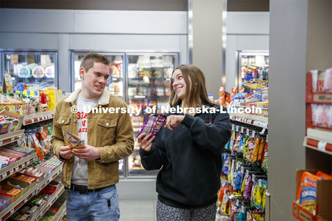 Abel Sandoz Dining Center photo shoot. Students shopping in Herbie's Market convenience store. March