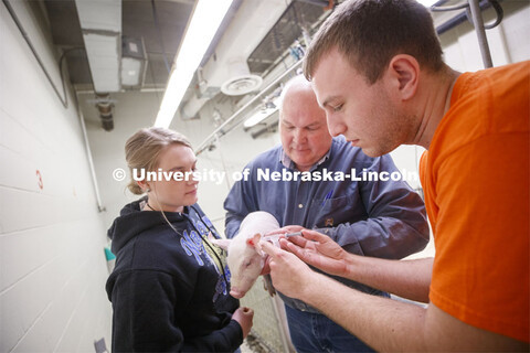 Laura Reiling (left), freshman in Animal Science from Malcom, NE, and Clayton Thomas (right), freshm