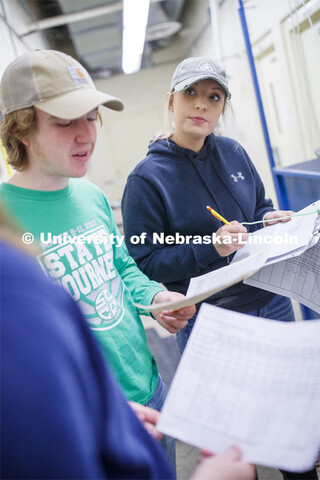 Lexie Schuster, senior in Animal Science from Elk Creek, NE, listens as her group finishes their doc