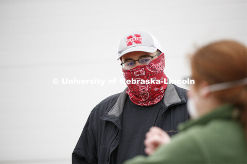 James Schnable listens to Christine Smith as they plan the day's planting. James Schnable corn resea