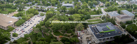 The line of cars for the flower give-away snaked through the parking lot east of the Dental College,