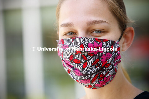 Drea Poole, a senior in Global Studies, Women's and Gender Studies wears a mask. Photo shoot of stud