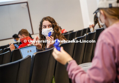 Allison Zetterman discusses how an ATP molecule fits into a hexokinase enzyme with her class partner