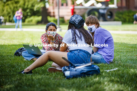 Daniela Chavez, left, and Alice Richter do group discussion during Katie Anania's Visualizing Crisis