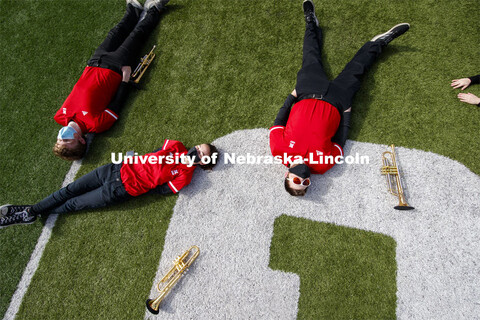 Cornhusker Marching Band, Cheer Squad and Homecoming Royalty met in the empty Memorial Stadium to re