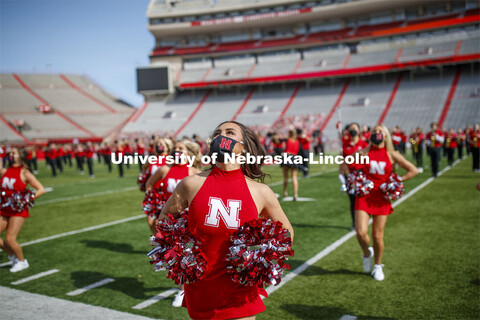 Cornhusker Marching Band, Cheer Squad and Homecoming Royalty met in the empty Memorial Stadium to re