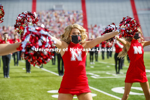 Cornhusker Marching Band, Cheer Squad and Homecoming Royalty met in the empty Memorial Stadium to re