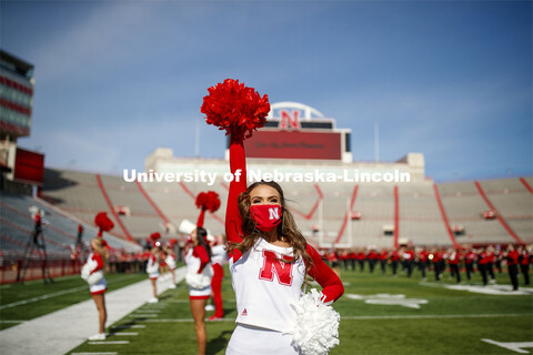 Cornhusker Marching Band, Cheer Squad and Homecoming Royalty met in the empty Memorial Stadium to re