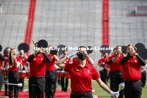 Cornhusker Marching Band, Cheer Squad and Homecoming Royalty met in the empty Memorial Stadium to re