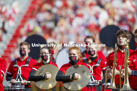 Cornhusker Marching Band, Cheer Squad and Homecoming Royalty met in the empty Memorial Stadium to re