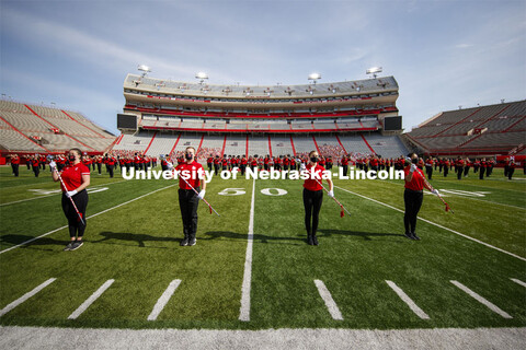 Cornhusker Marching Band, Cheer Squad and Homecoming Royalty met in the empty Memorial Stadium to re