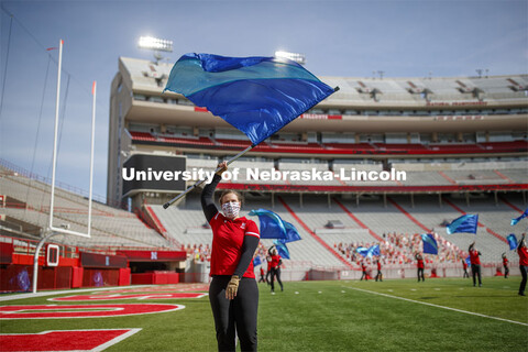 Cornhusker Marching Band, Cheer Squad and Homecoming Royalty met in the empty Memorial Stadium to re