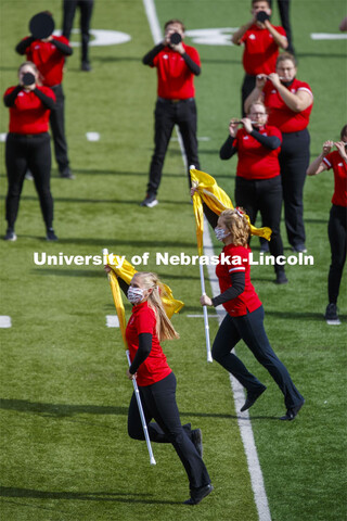 Cornhusker Marching Band, Cheer Squad and Homecoming Royalty met in the empty Memorial Stadium to re