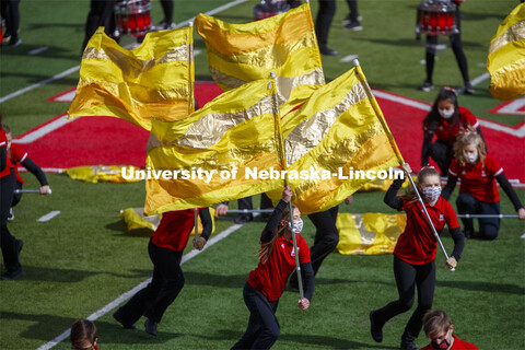 Cornhusker Marching Band, Cheer Squad and Homecoming Royalty met in the empty Memorial Stadium to re