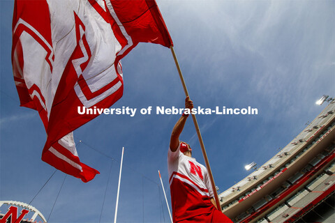 Cornhusker Marching Band, Cheer Squad and Homecoming Royalty met in the empty Memorial Stadium to re