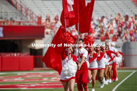 Cornhusker Marching Band, Cheer Squad and Homecoming Royalty met in the empty Memorial Stadium to re