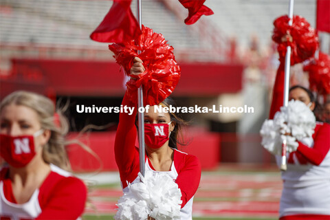 Cornhusker Marching Band, Cheer Squad and Homecoming Royalty met in the empty Memorial Stadium to re