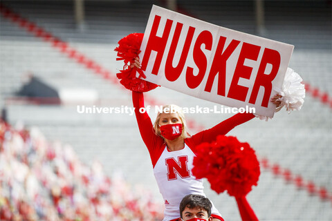 Cornhusker Marching Band, Cheer Squad and Homecoming Royalty met in the empty Memorial Stadium to re