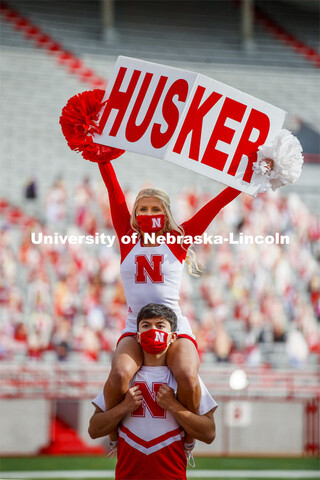 Cornhusker Marching Band, Cheer Squad and Homecoming Royalty met in the empty Memorial Stadium to re