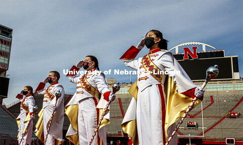 Cornhusker Marching Band, Cheer Squad and Homecoming Royalty met in the empty Memorial Stadium to re