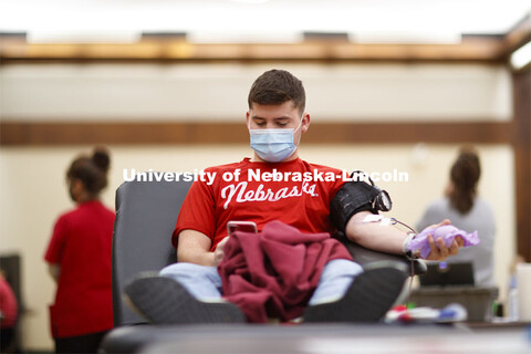 Students donate in the Homecoming Blood Drive in the Nebraska Union ballroom on city campus. October