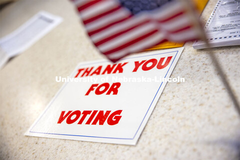 A sign on the table thanks voters for voting. Voting in the Nebraska Union for the 2020 Presidential