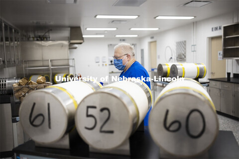 Robert Schmaltz, manager of the Gnotobiotic Mouse Facility, uses an autoclave to sterilize supply cy