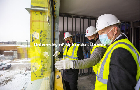 Chancellor Ronnie Green, Bart Thomsen, senior project manager of Tetrad Property Group, and Dan Dunc