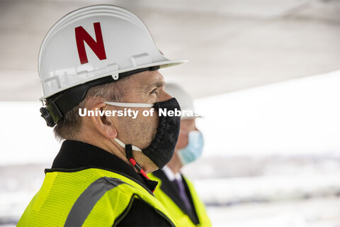 Chancellor Ronnie Green, and Dan Duncan, Executive Director of Nebraska Innovation Campus, admire th