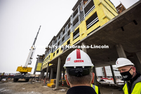 Chancellor Ronnie Green, listens as Bart Thomsen, senior project manager of Tetrad Property Group, g