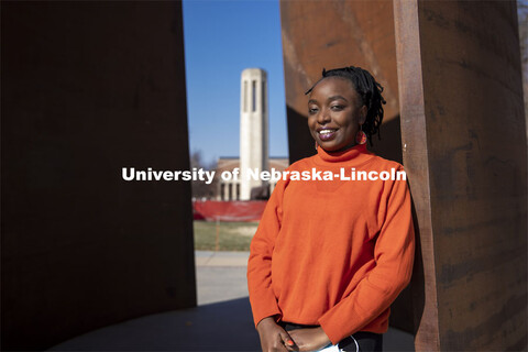 Shemsa Ndahiro Iribagiza, a senior integrated science major from Kigali, Rwanda, stands by the Green