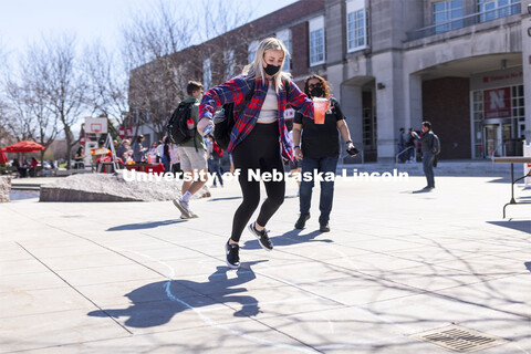 Brenna Paul shows her hopscotch form at the Spring Breakout Festival. Students have fun at the Sprin