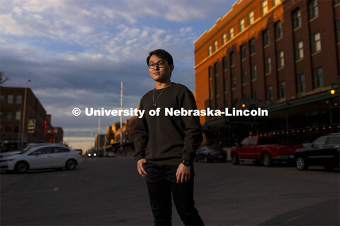 Koo Sheng Jit, a junior in management, poses in the Haymarket for an ASEM recruitment story. April 1