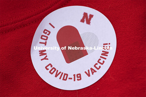 "I GOT MY COVID-19 VACCINE!" sticker. Vaccine clinic in the Coliseum with a free food and goodies te