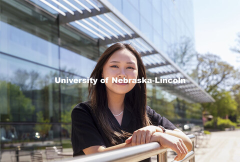 Chau Nguyen for APIDA Heritage Month story. Nguyen poses in front of Howard Hawks Hall. April 29, 20