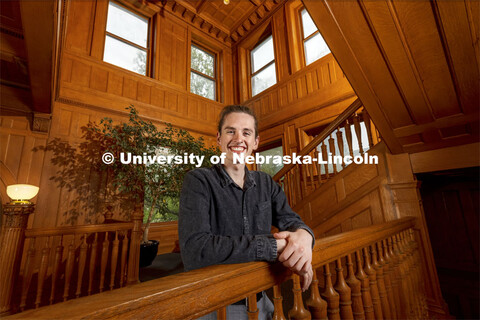 Aus Perez, landscape architecture major poses on the steps inside Architecture Hall for ASEM recruit