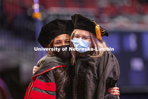 Manami Shah is hugged by Professor Stacie Ray. Shah received her Doctor of Audiology degree. Graduat