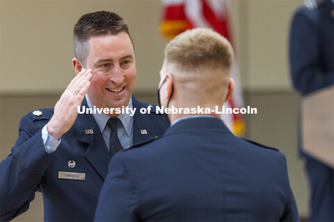 Lieutenant Colonel C. J. Zaworski salutes a newly commissioned Second Lieutenant during the Air Forc