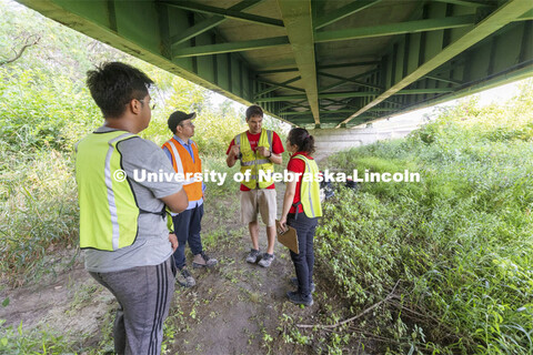 Ricky Woods, Associate Professor of Civil and Environmental Engineering, discusses with Awg Ku Ahmad