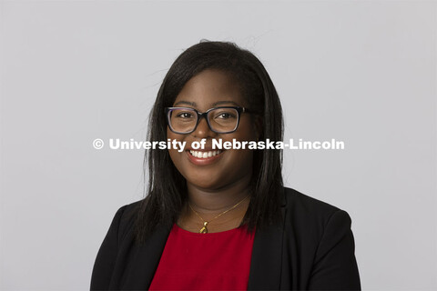 Studio portrait of Myrianna Bakou, senior assistant director at the Nebraska College Preparatory Aca