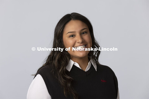 Studio portrait of Kali Moreno, program associate at the Nebraska College Preparatory Academy. Augus