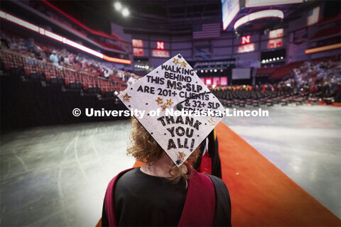 Emma Loberg’s decorated mortar board thanks all who made her speech-language pathology masters deg